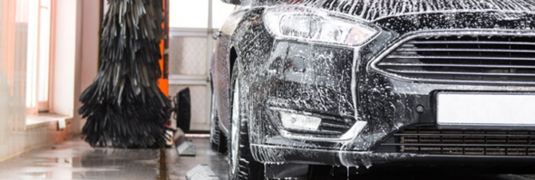 vehicle being washed in an in-bay automatic car wash